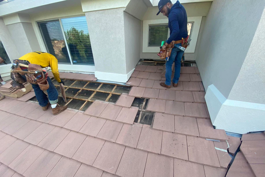 contractor repairing roof tiles jackson st golden co